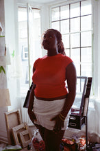 Load image into Gallery viewer, Notes on Grief by Chimamanda Ngozi Adichie with a sleeve by Okiki Akinfe