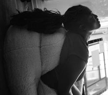 Load image into Gallery viewer, Notes on Grief by Chimamanda Ngozi Adichie with a sleeve by Okiki Akinfe